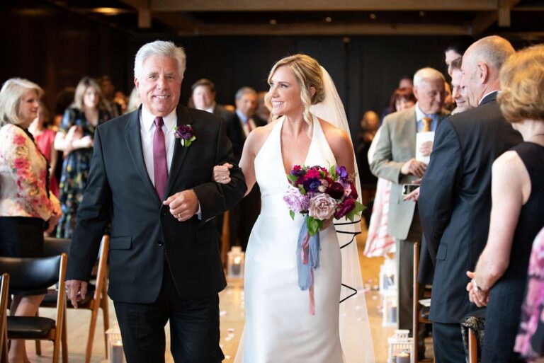 Bride walking down the isle with her father