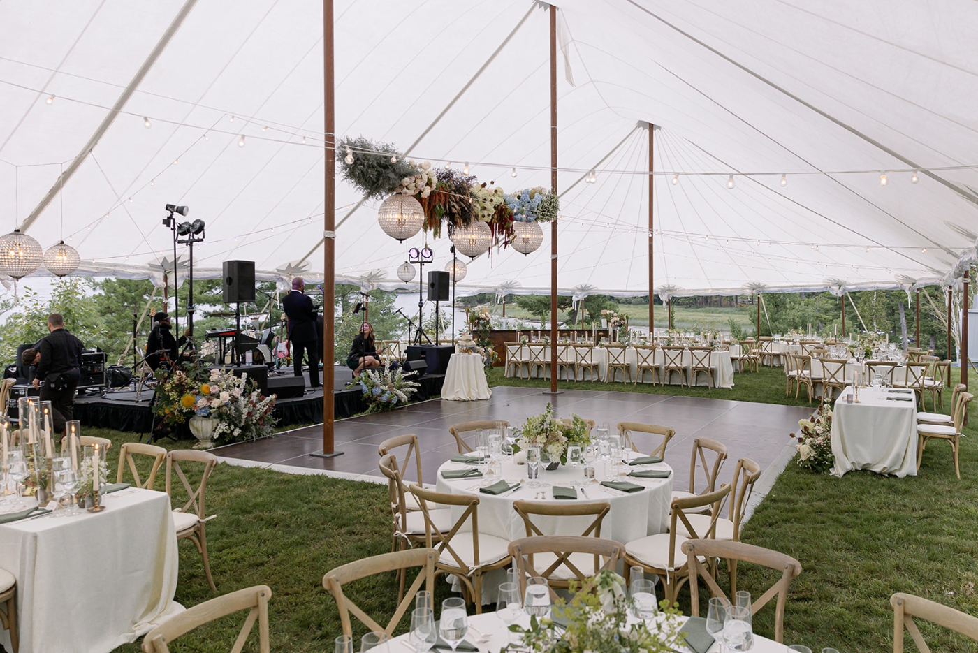 A tented wedding reception on a private estate on the Kennebec River
