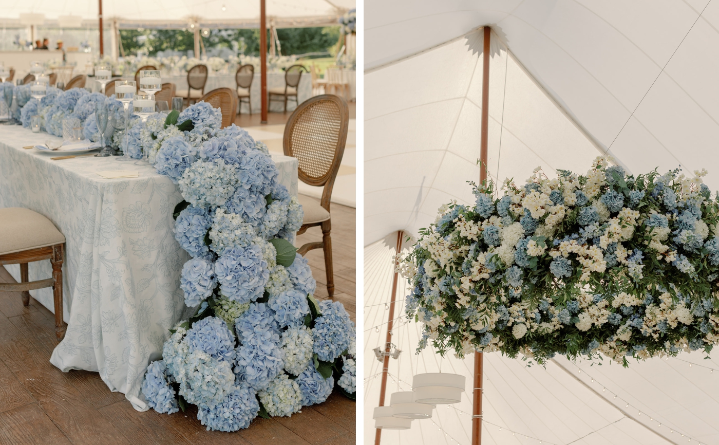 A large hanging floral installation made of greenery, white flowers, and blue hydranageas 